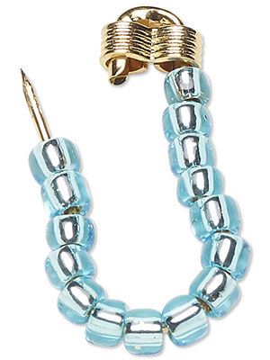 Beaded safety pin bail